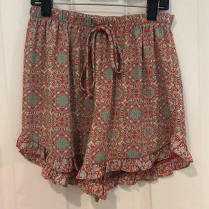 coral/red and teal patterned flowy shorts